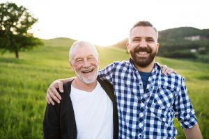 Man Spending Time With Senior Father