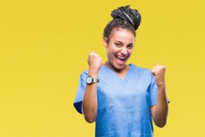happy nurse with yellow background