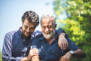 adult son with senior father