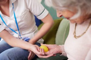 occupational therapy session with senior woman