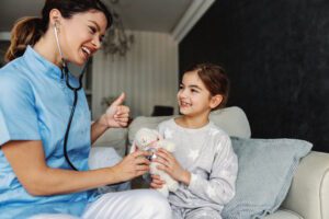 little girl with home nurse