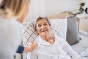 senior woman resting in bed