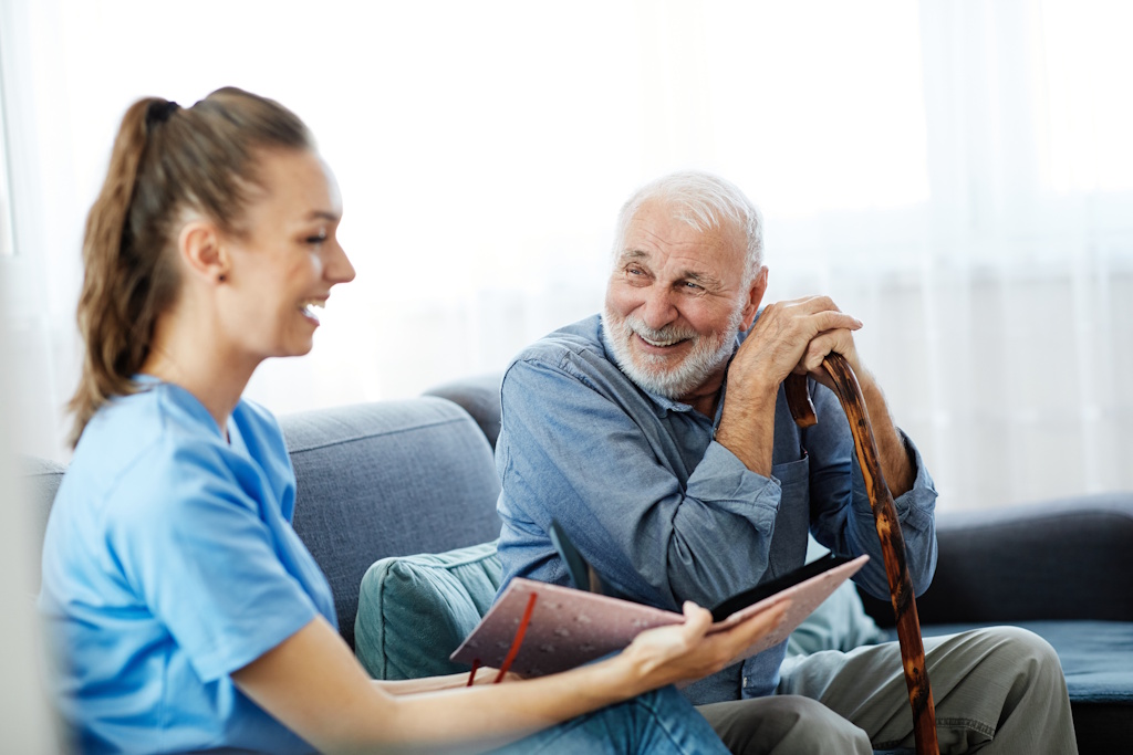 private duty caregiver with senior man