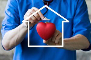 health worker holding heart