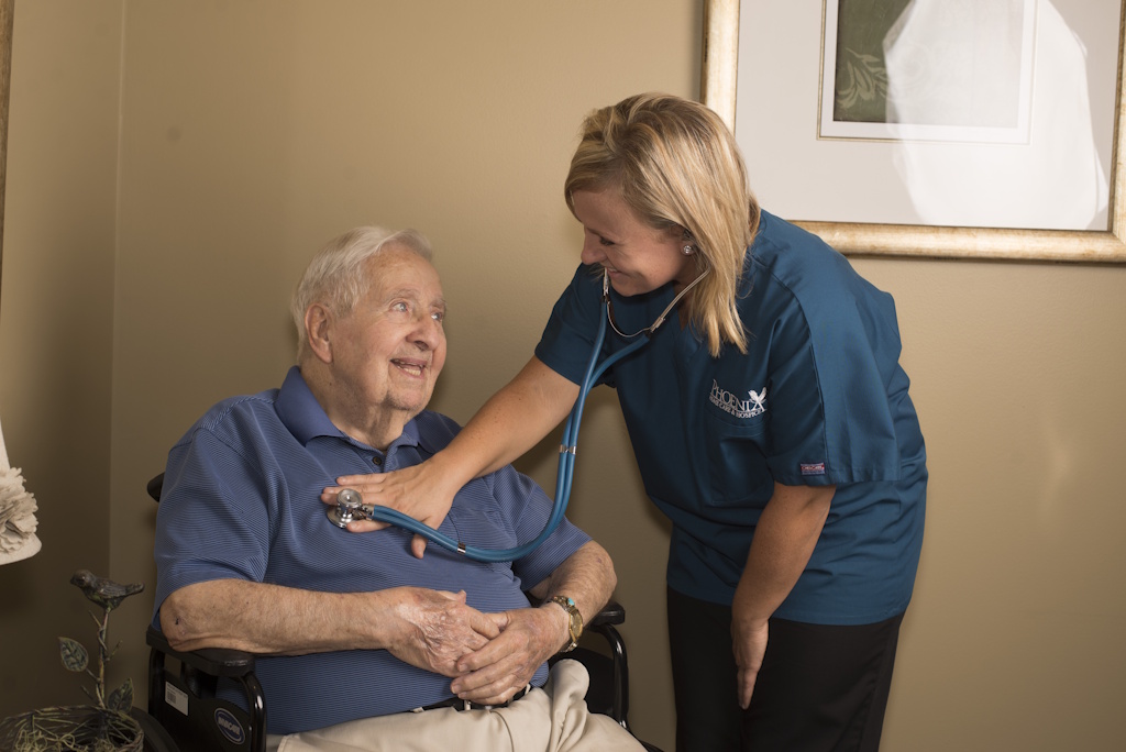 private duty caregiver with senior man