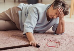 senior woman fallen on ground