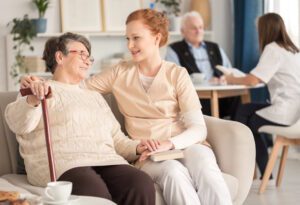 senior woman with private duty caregiver