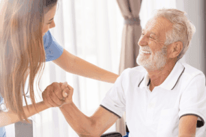 private duty caregiver with senior man