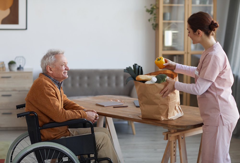 home caregiver with senior man