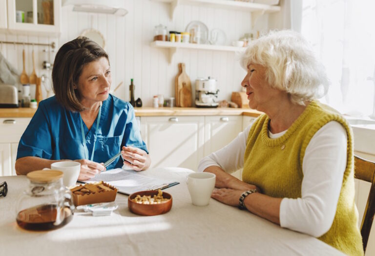 senior woman with home health nurse